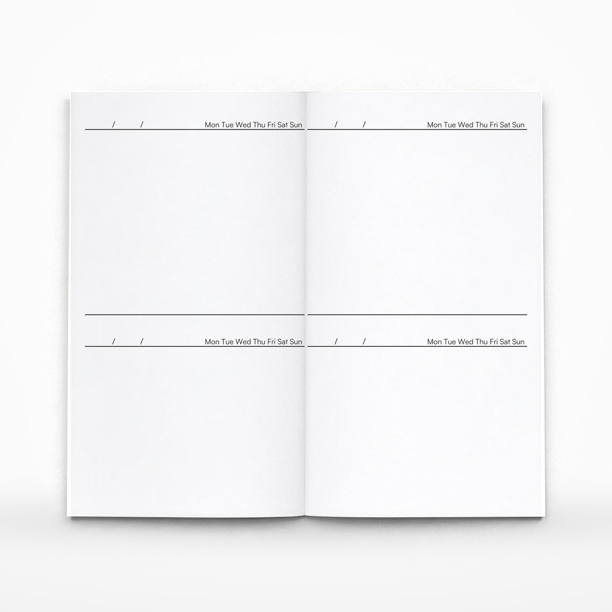 The Monthly Planner Insert interior spread