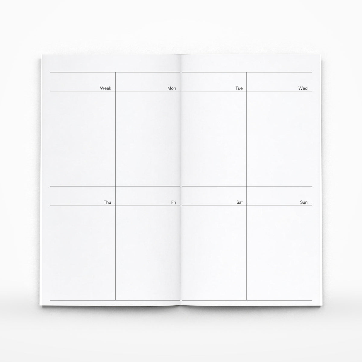 The Weekly Planner Insert interior spread