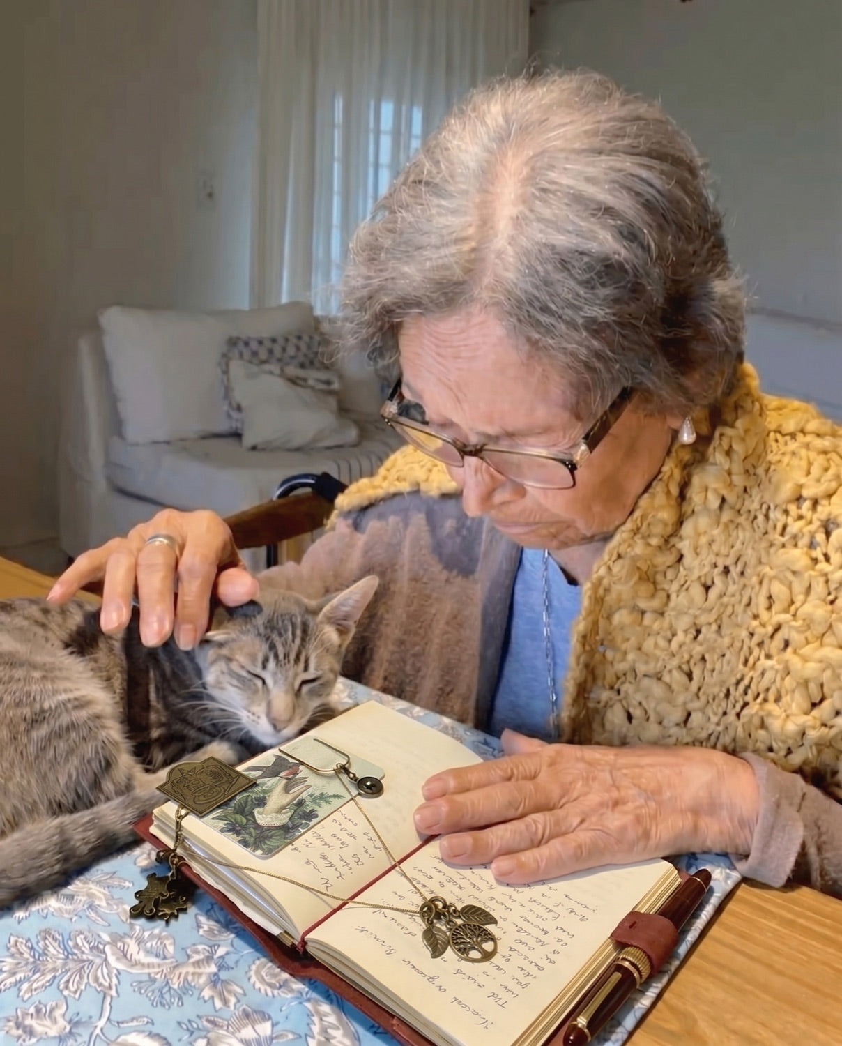 Debbie writing in her Momento